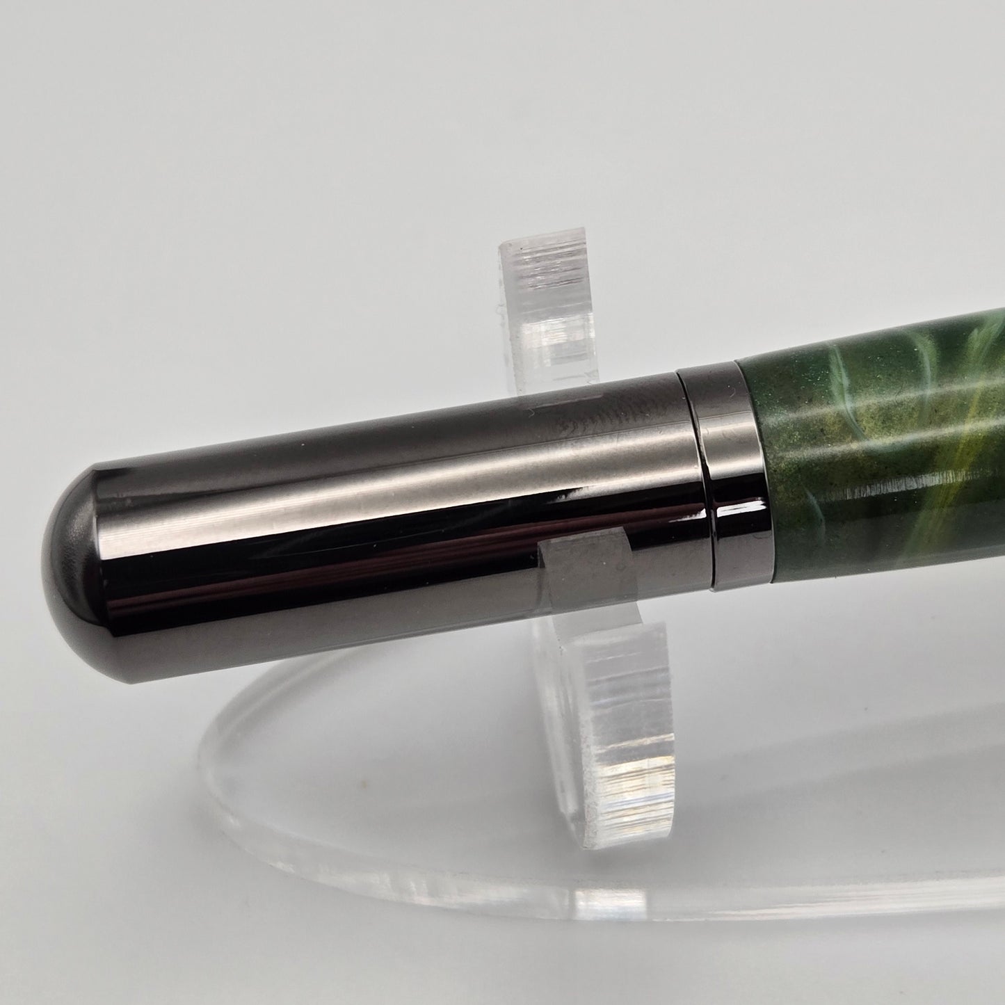 Close-up of a chrome gray pen cap